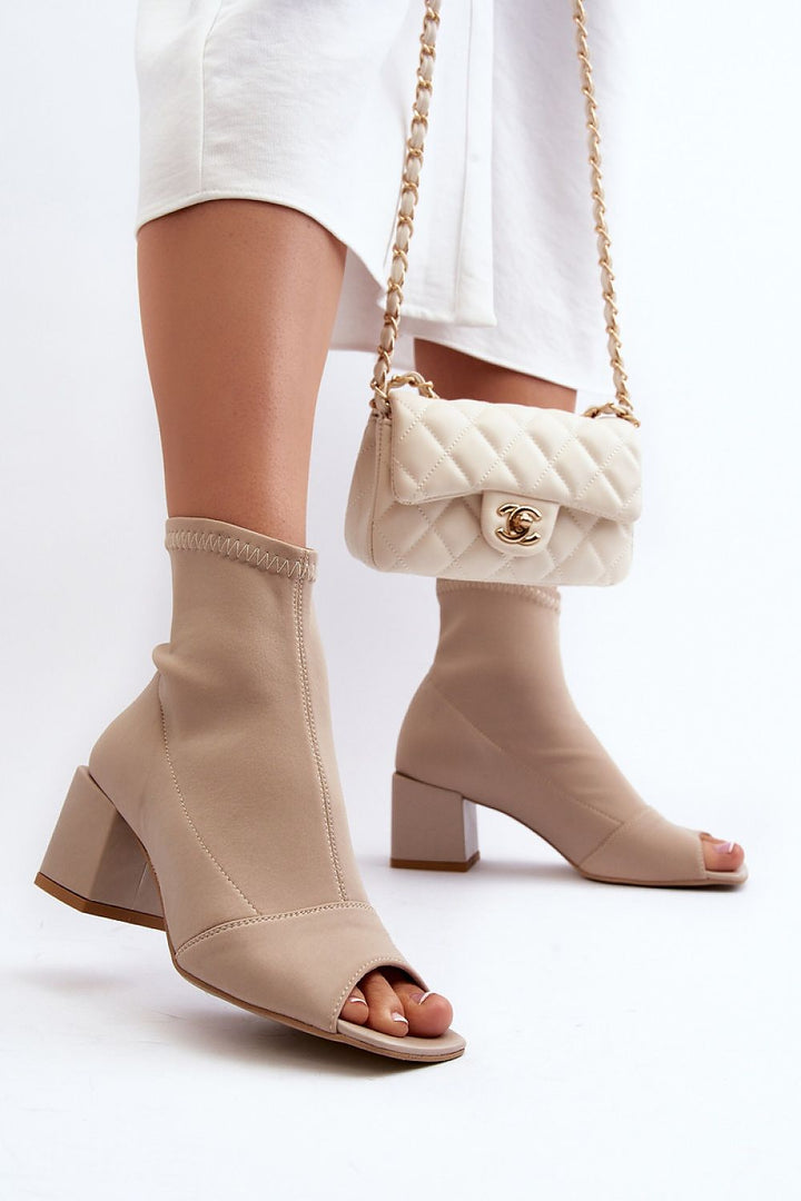 Heel boots Step in style