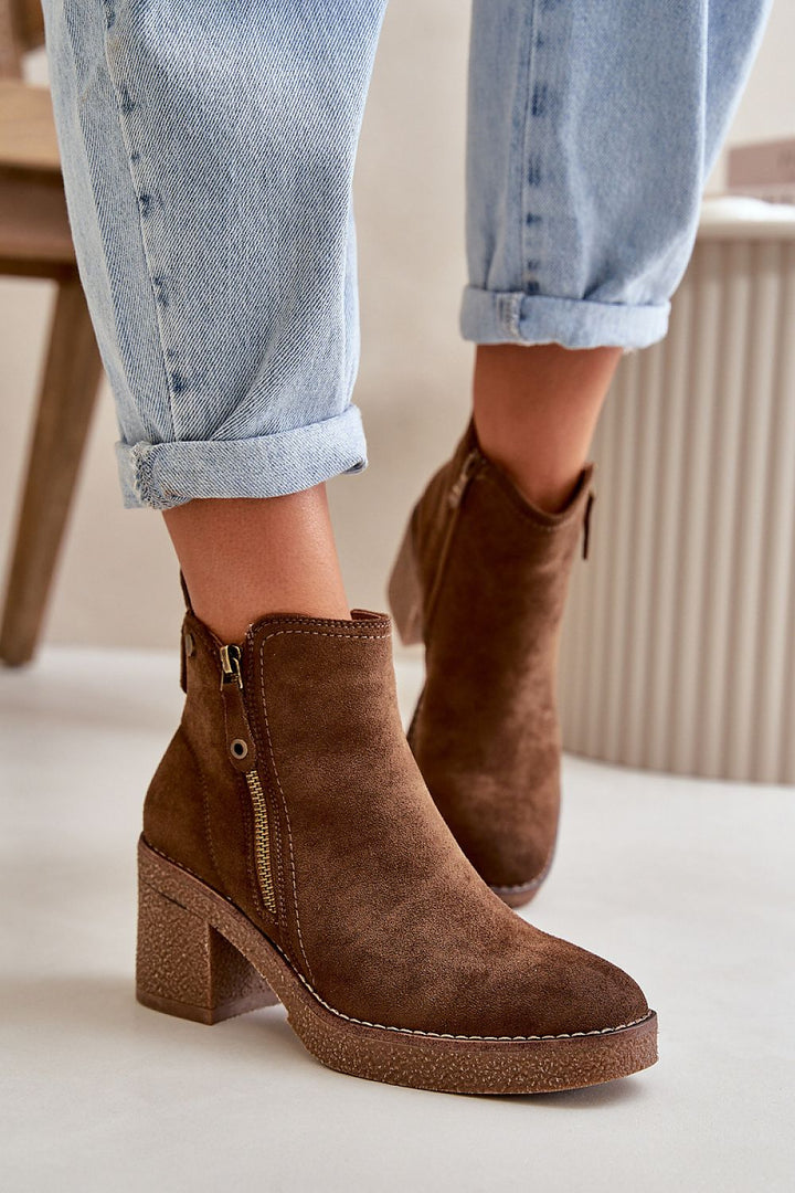 Heel boots Step in style