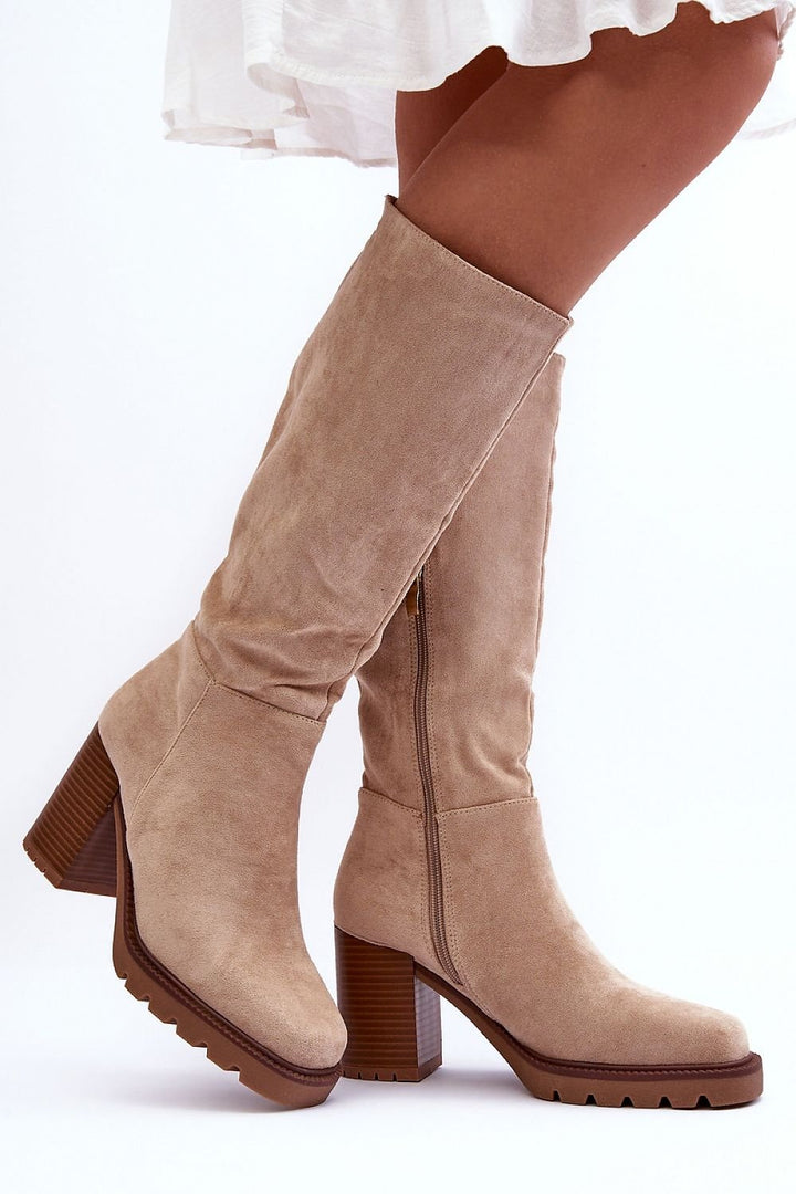 Heel boots Step in style