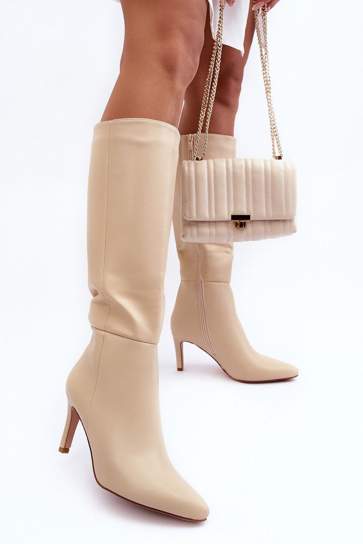 Heel boots Step in style