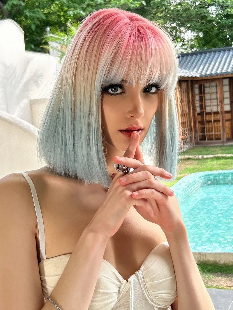 Ombre colored bob wig with bangs, perfect for cosplay or everyday wear.