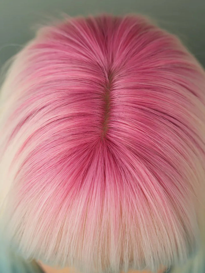 Ombre colored bob wig with bangs, perfect for cosplay or everyday wear.