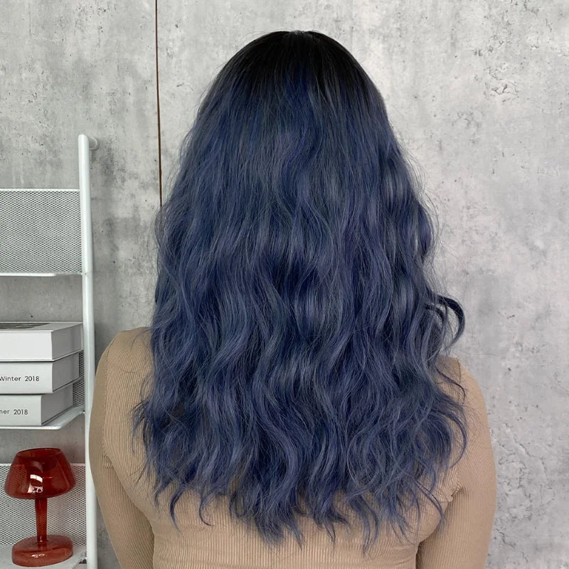 Short curly ombre blue wig with bangs for women. Shoulder-length wavy bob style made of synthetic hair. Perfect for daily wear, cosplay, and Halloween.