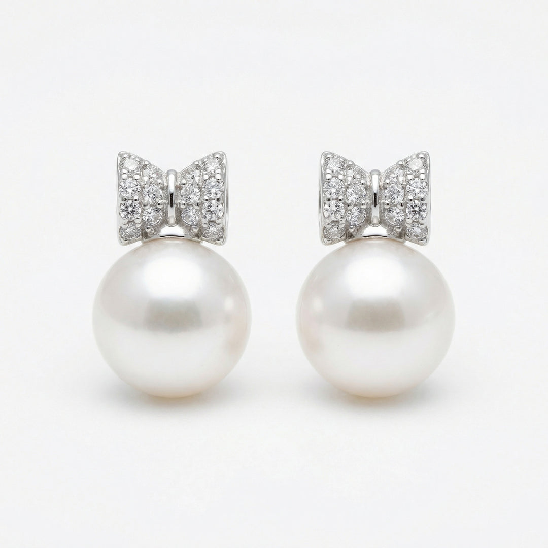 925 Sterling Silver White Pearl Drop Earrings with Diamond-Accented Bow Motifs