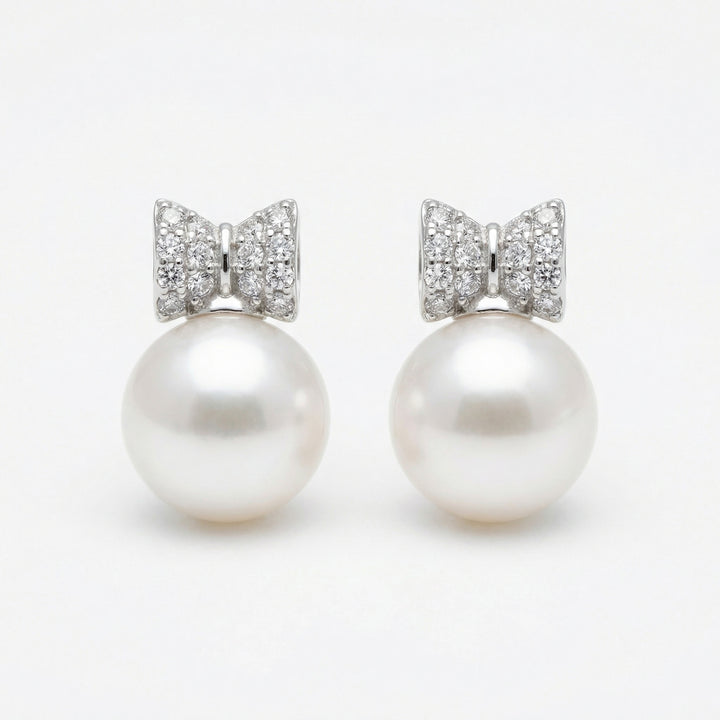 925 Sterling Silver White Pearl Drop Earrings with Diamond-Accented Bow Motifs