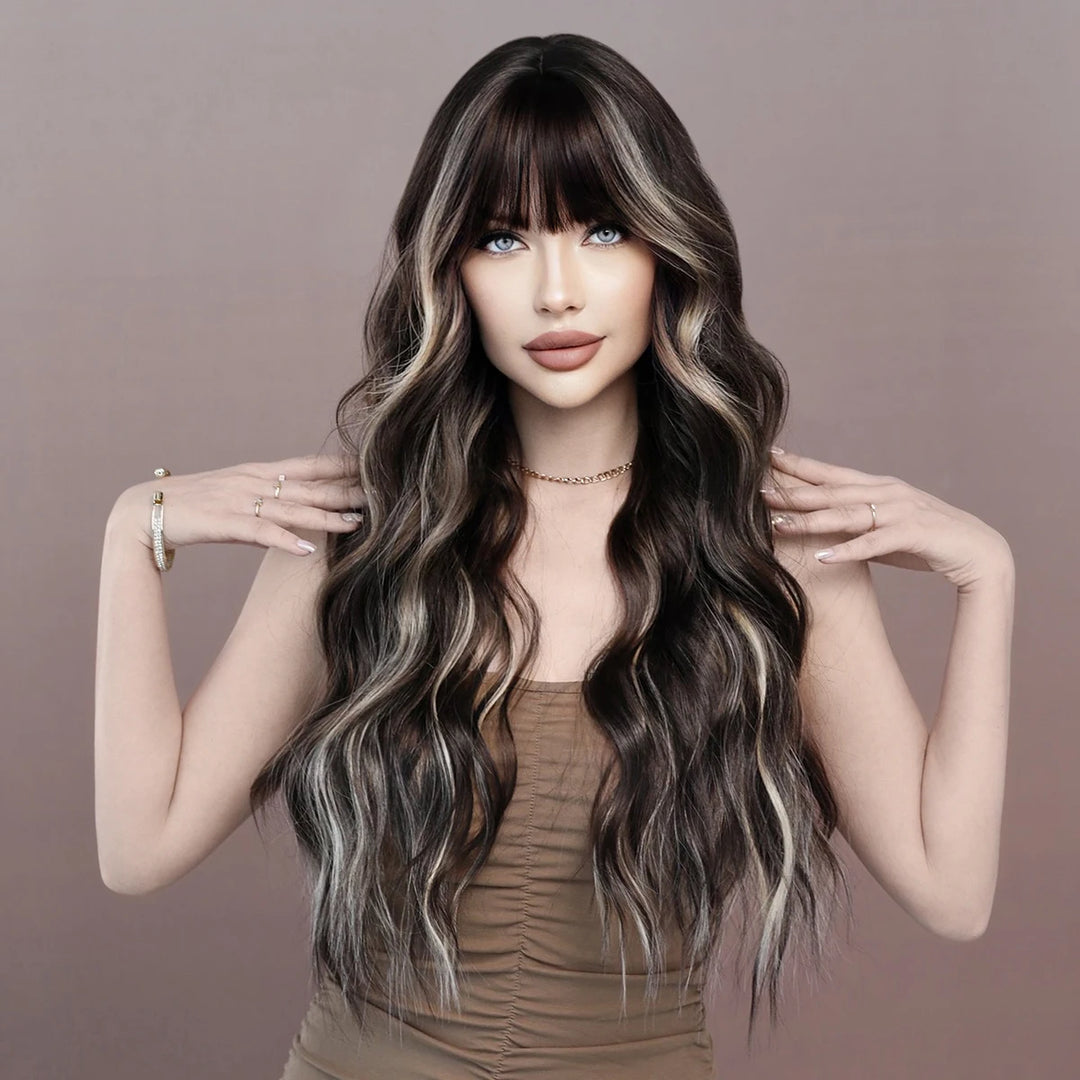 Brown wig with bangs, long wavy style with mixed blonde highlights. Made from natural curly synthetic fiber, resistant to heat. Perfect for daily use by women.