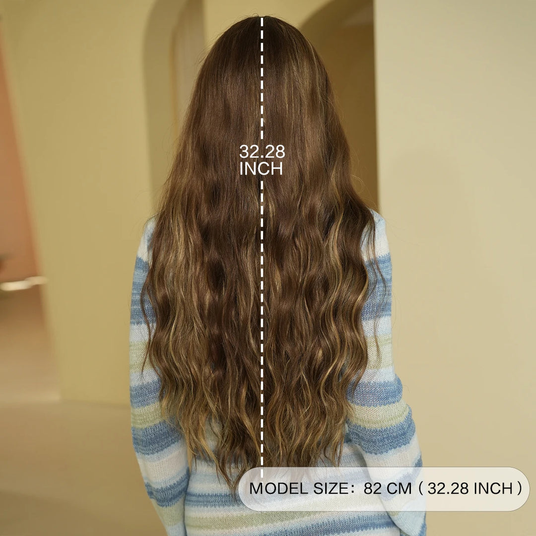 32 Inches Extra Long Honey Blond Middle Parting Wig with Bangs. This synthetic water wave wig is glueless with a natural hairline and matte hair finish.