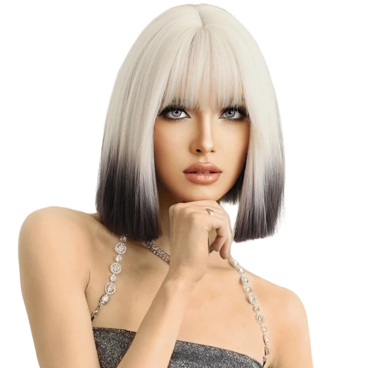 Ombre colored bob wig with bangs, perfect for cosplay or everyday wear.