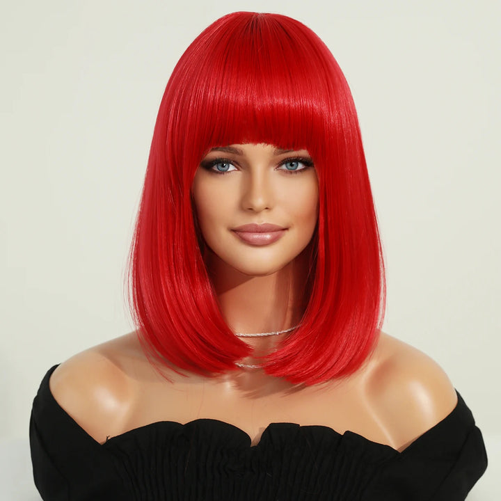 Short red wig with bangs for women, perfect for parties and cosplay. Made of heat-resistant synthetic material.