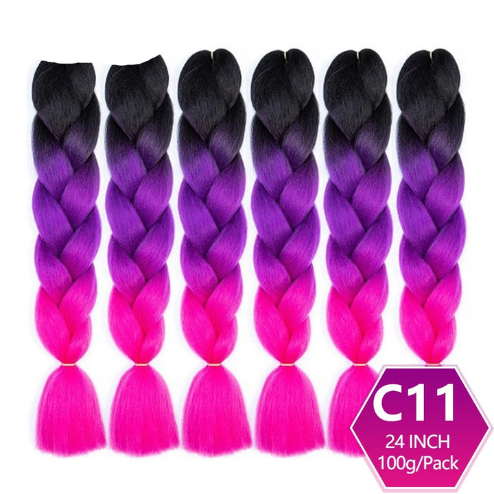 Set of braided hair extensions with black, purple, and pink color gradient on a white background. 