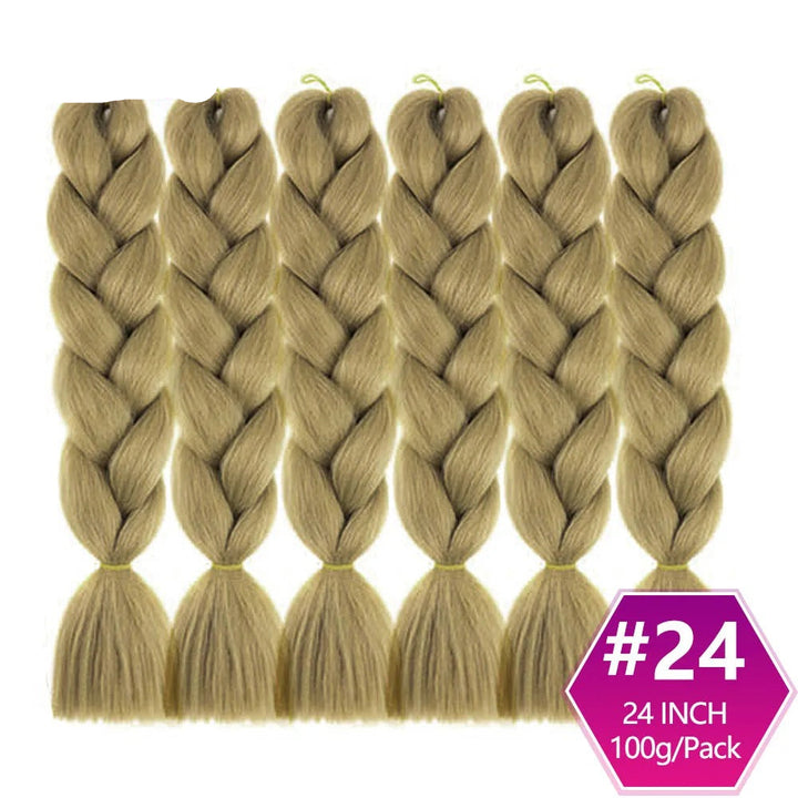 Set of blonde braided hair extensions with  on a white background.