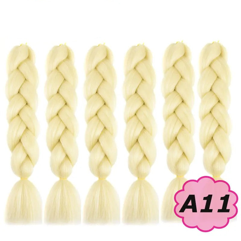 Set of six blonde braided hair extensions with  branding on a white background.