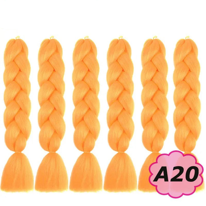 Orange braided hair extensions with ' branding on a white background.