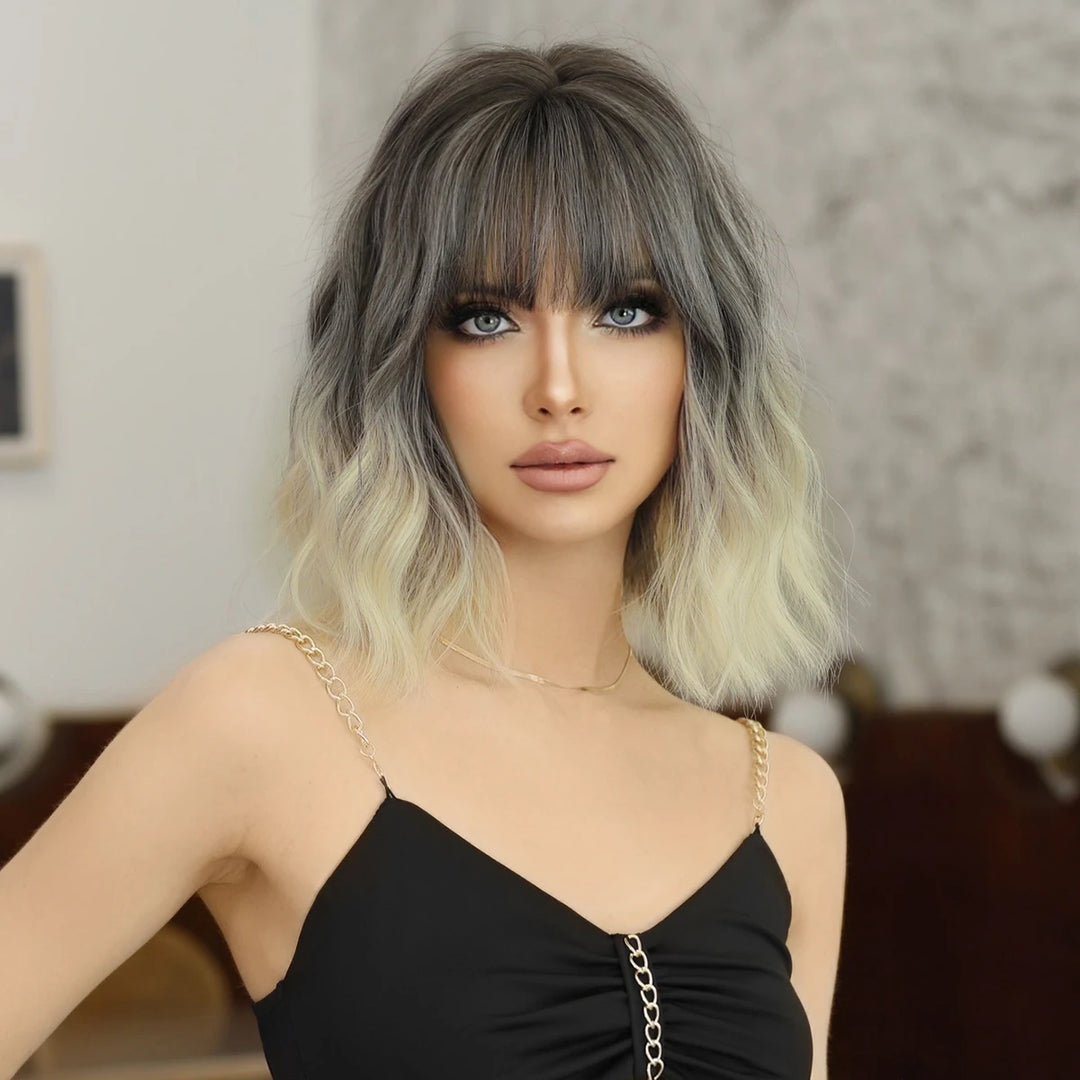 Ombre colored bob wig with bangs, perfect for cosplay or everyday wear.
