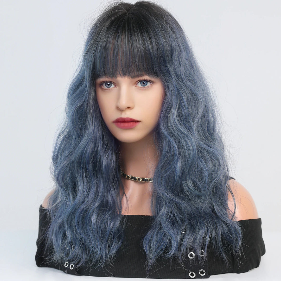 Short curly ombre blue wig with bangs for women. Shoulder-length wavy bob style made of synthetic hair. Perfect for daily wear, cosplay, and Halloween.
