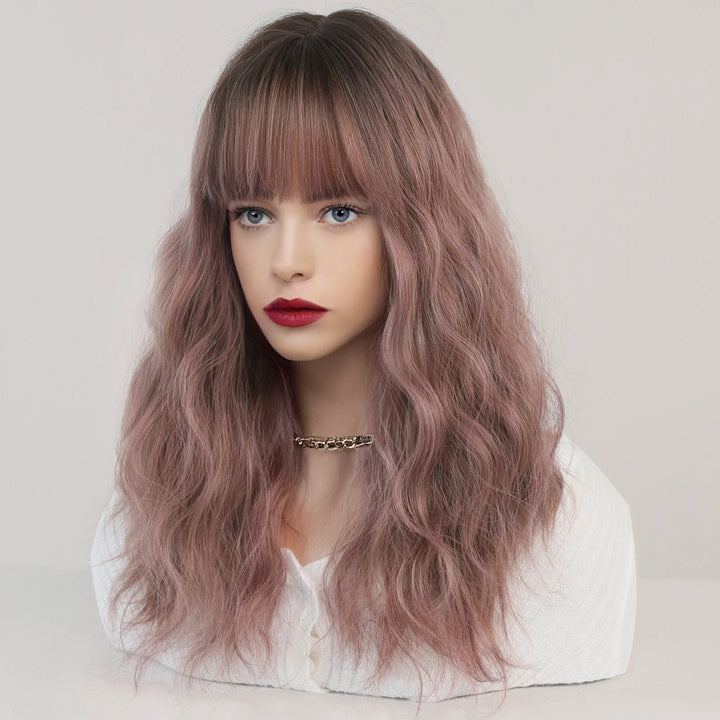 Short curly ombre blue wig with bangs for women. Shoulder-length wavy bob style made of synthetic hair. Perfect for daily wear, cosplay, and Halloween.