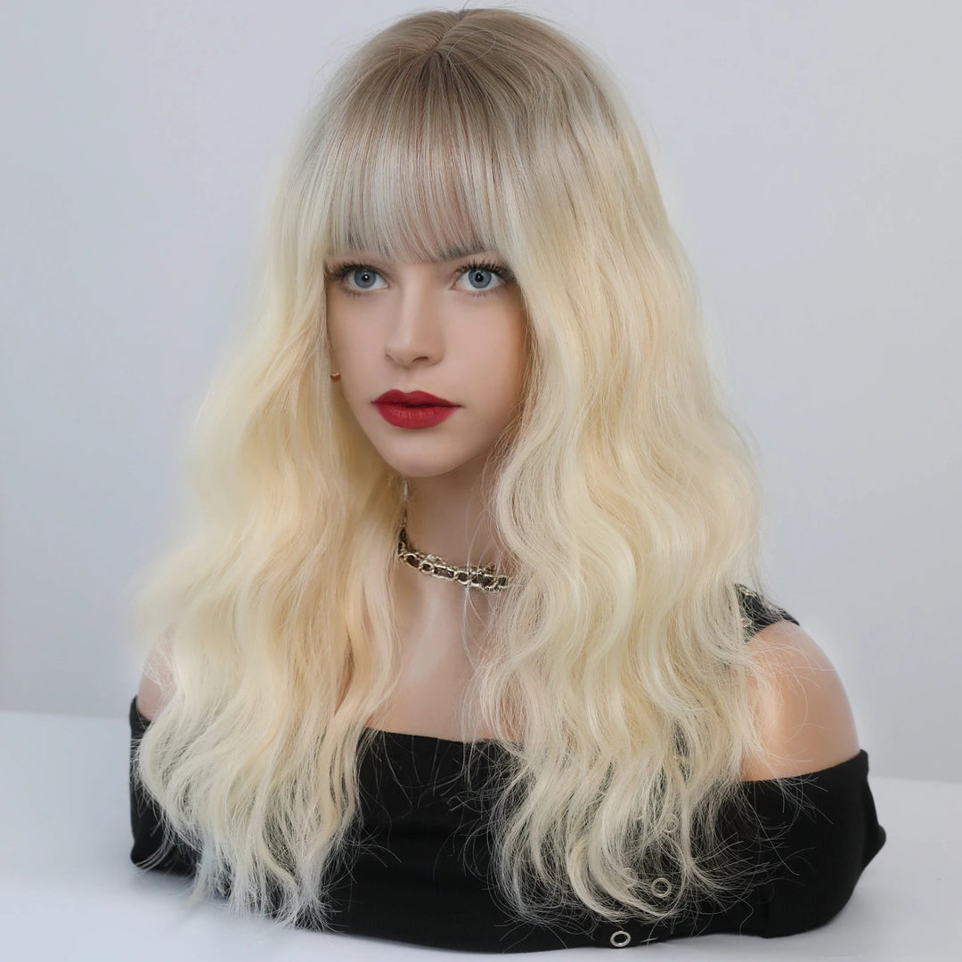 Short curly ombre blue wig with bangs for women. Shoulder-length wavy bob style made of synthetic hair. Perfect for daily wear, cosplay, and Halloween.