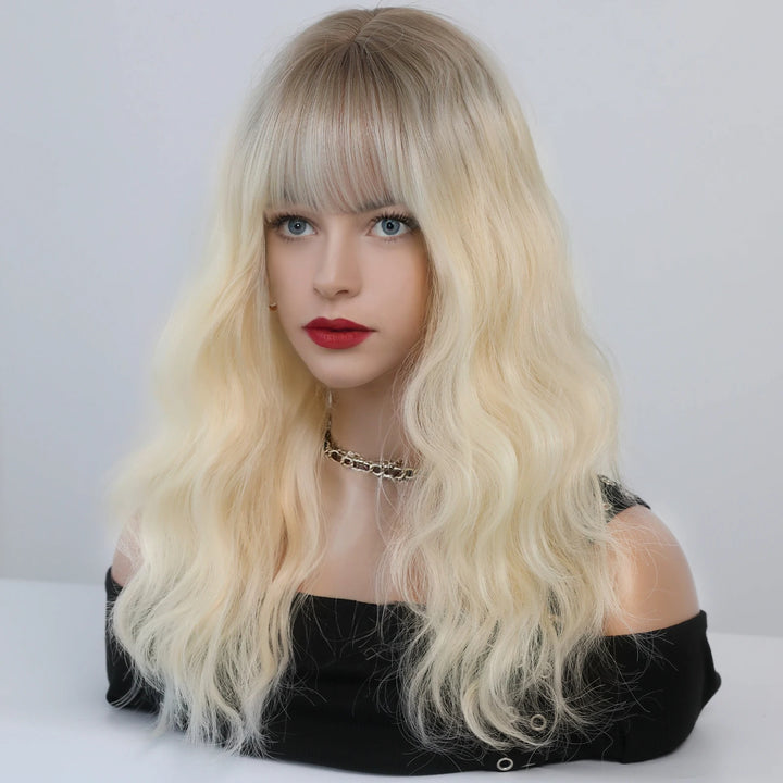 Short curly ombre blue wig with bangs for women. Shoulder-length wavy bob style made of synthetic hair. Perfect for daily wear, cosplay, and Halloween.