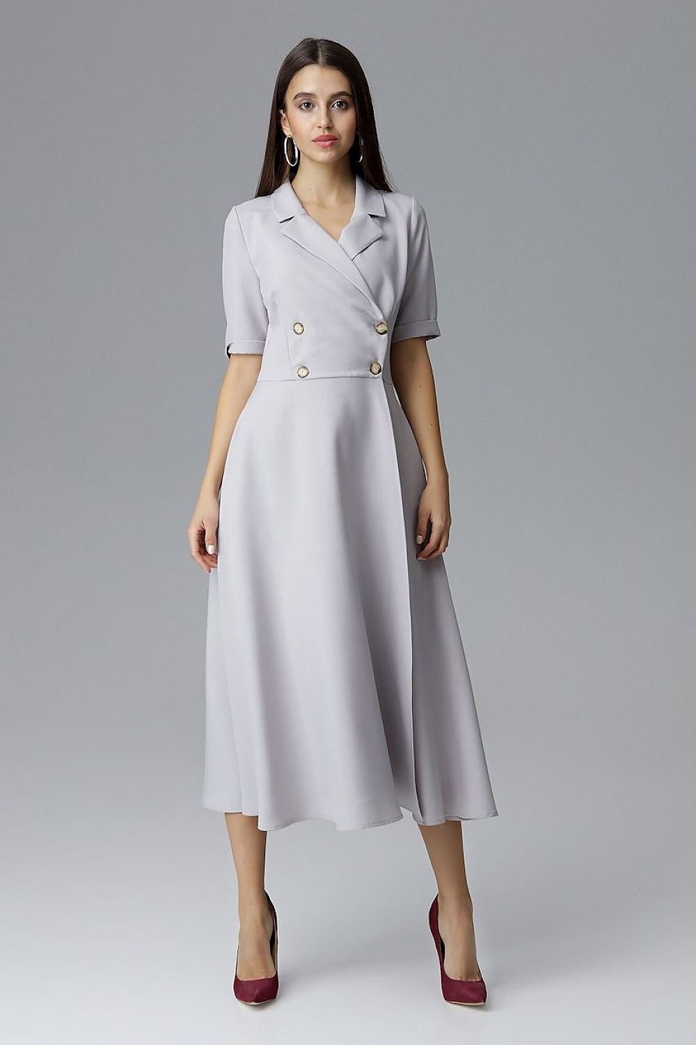 A 7/8-length double-breasted Daydress  Figl